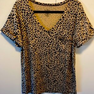 Leopard print tee shirt with pocket.